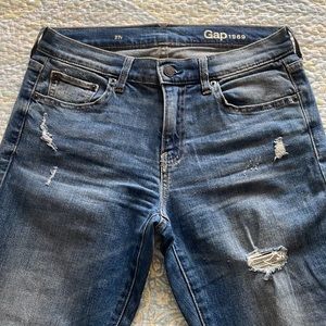 Gap mid rise slim jeans in medium wash with light distressing